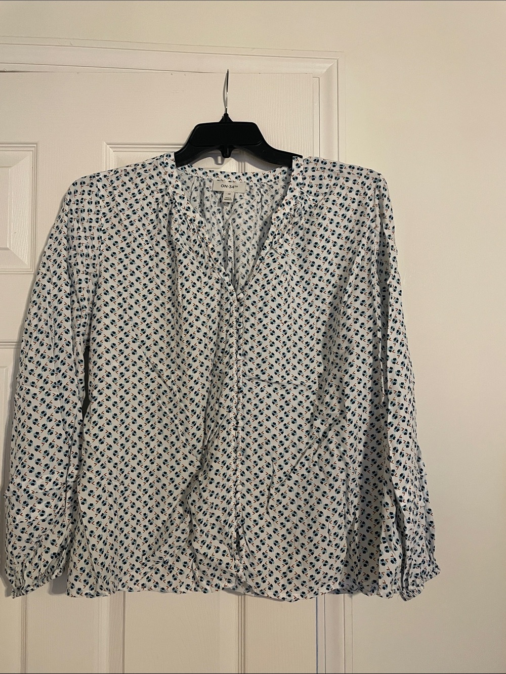 Lightweight White Floral V-Neck Blouse with Blue Print